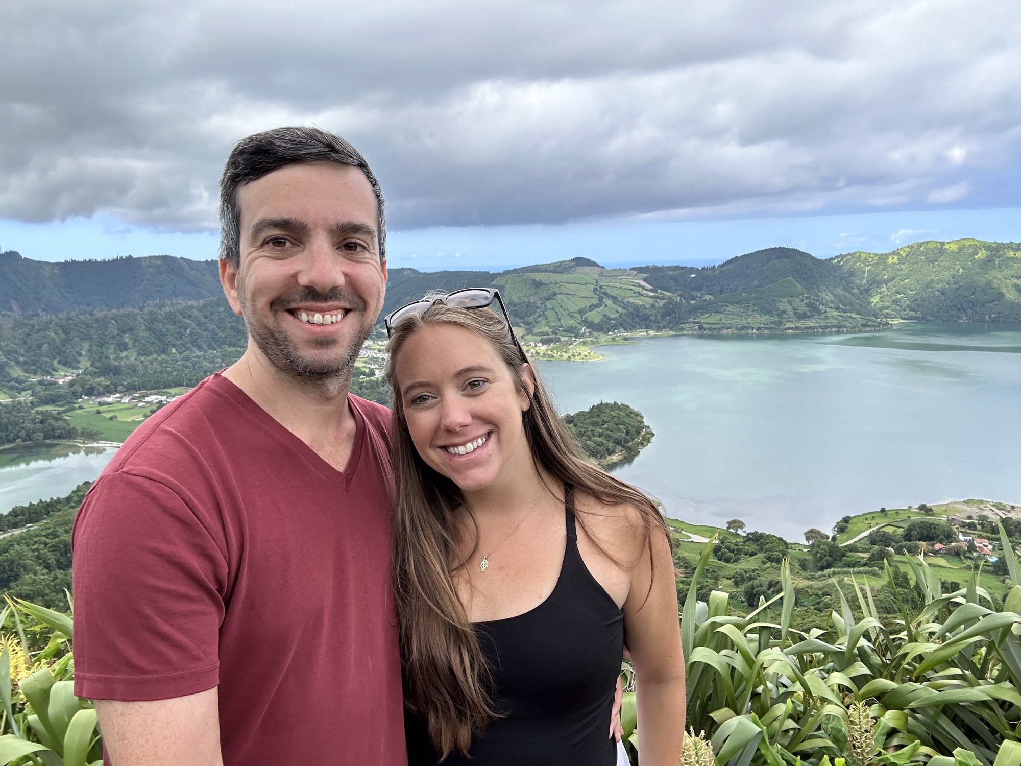 Brittany and her husband at a viewpoint above a crater lake in the Azores.