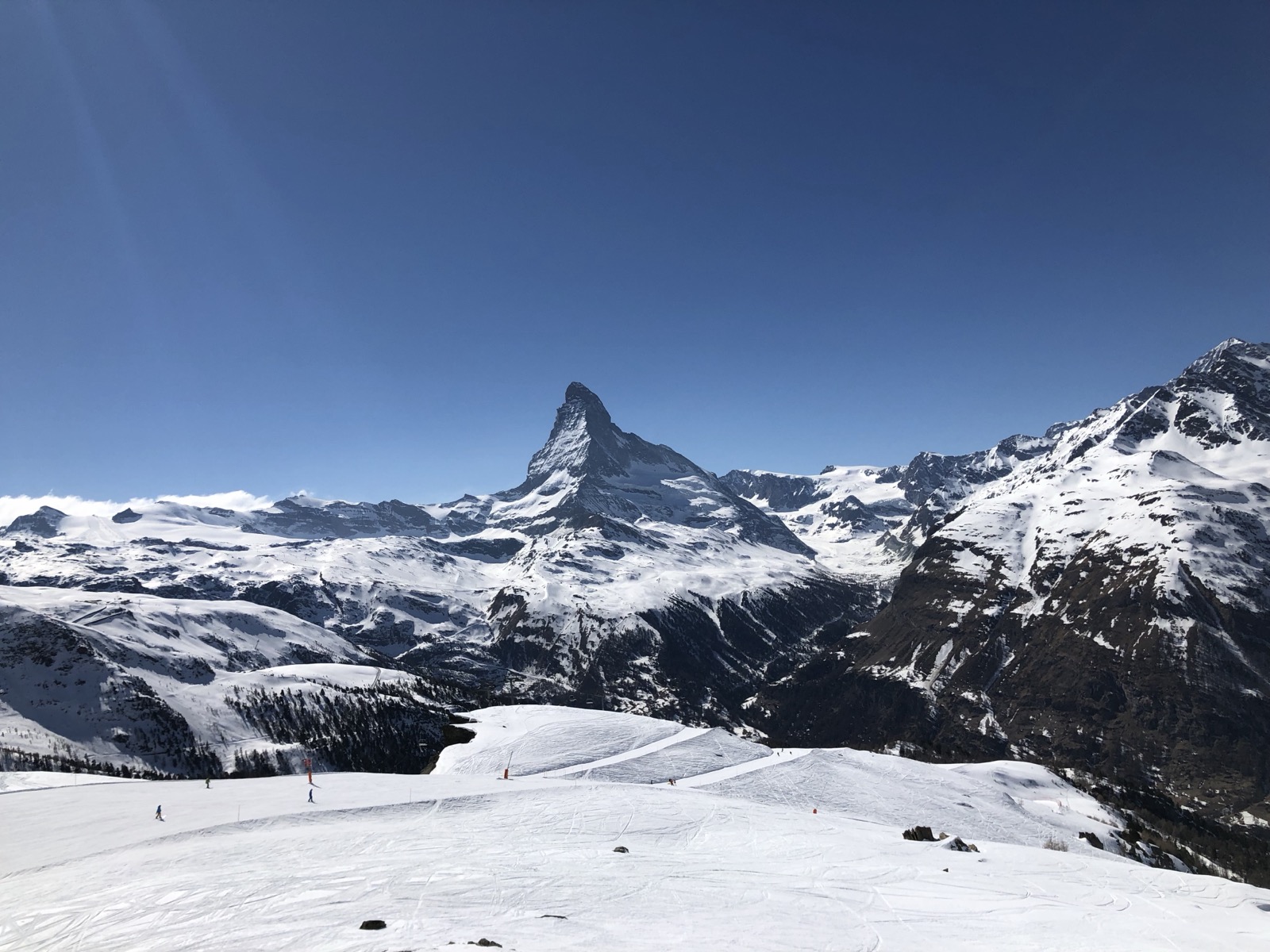The Matterhorn above wide, quiet pistes on a clear day in Zermatt.